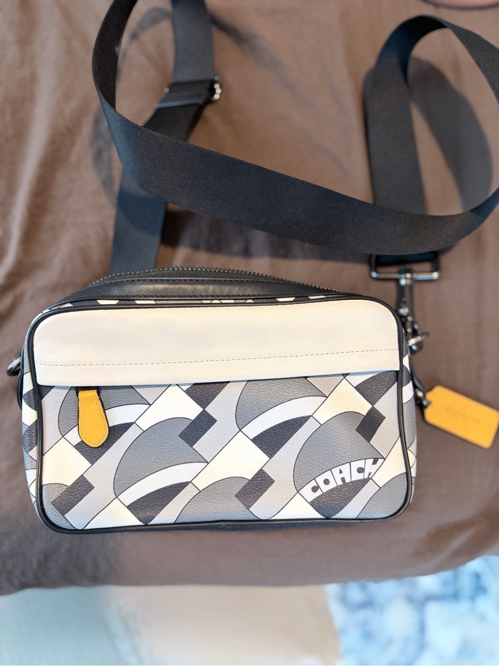 Coach 1976 Graham deco bridge print leather crossbody bag.